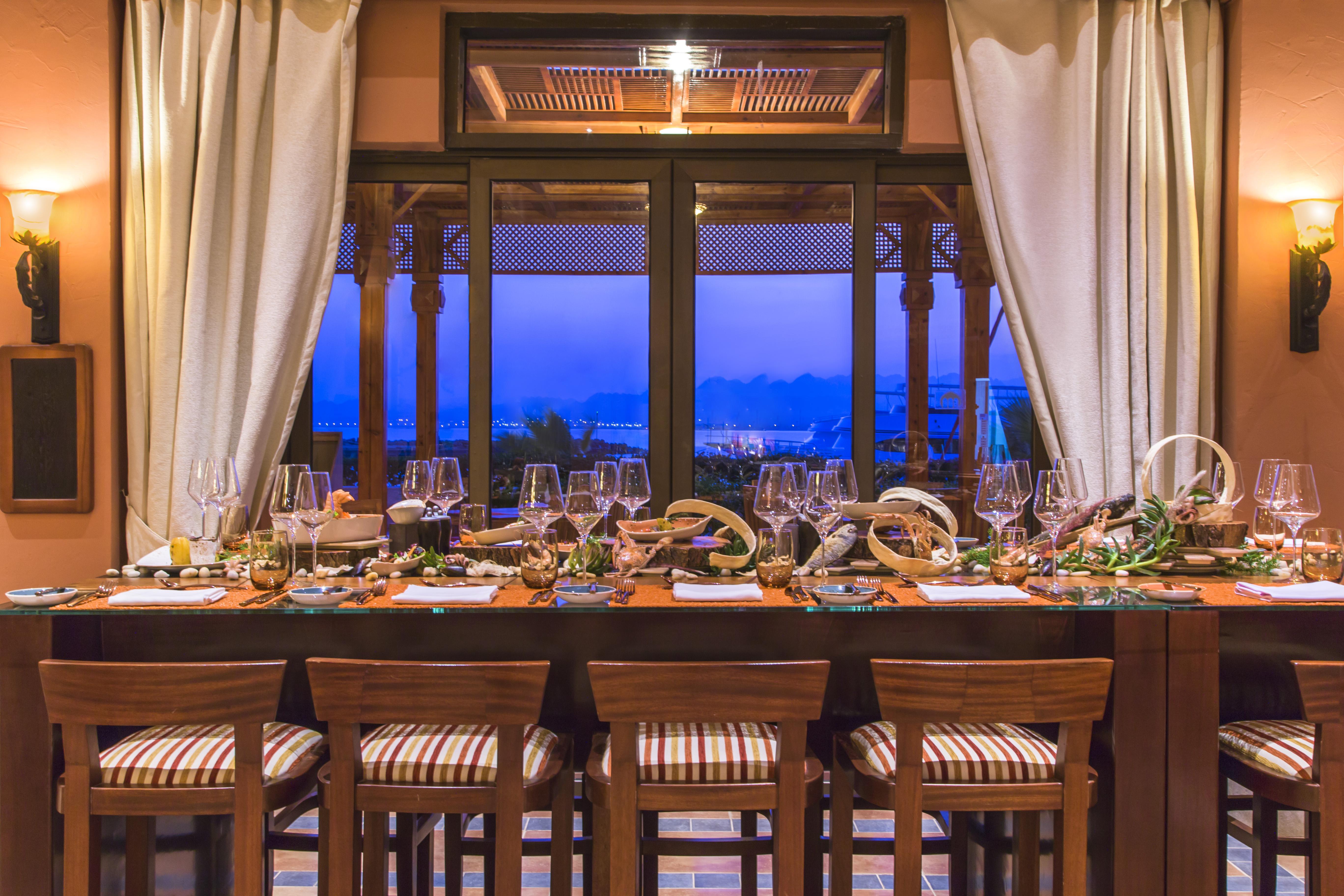 Kempinski Hotel Soma Bay Esterno foto A dining table set for a meal